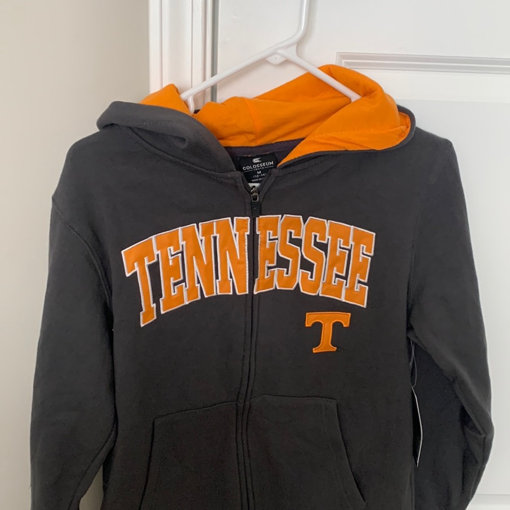 Brand new youth M (12-14) TN zip up hoodie with tags.